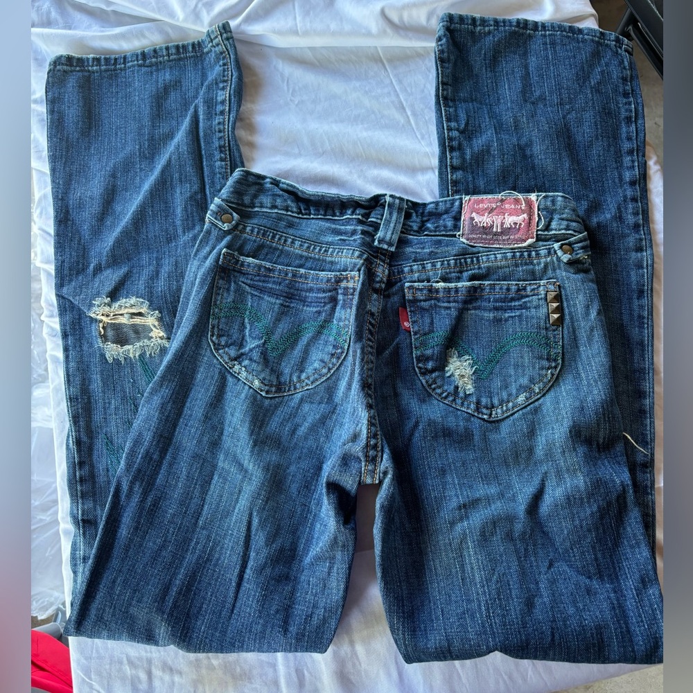 Levi's Dark Blue Boot Cut Jeans with Distressed Details